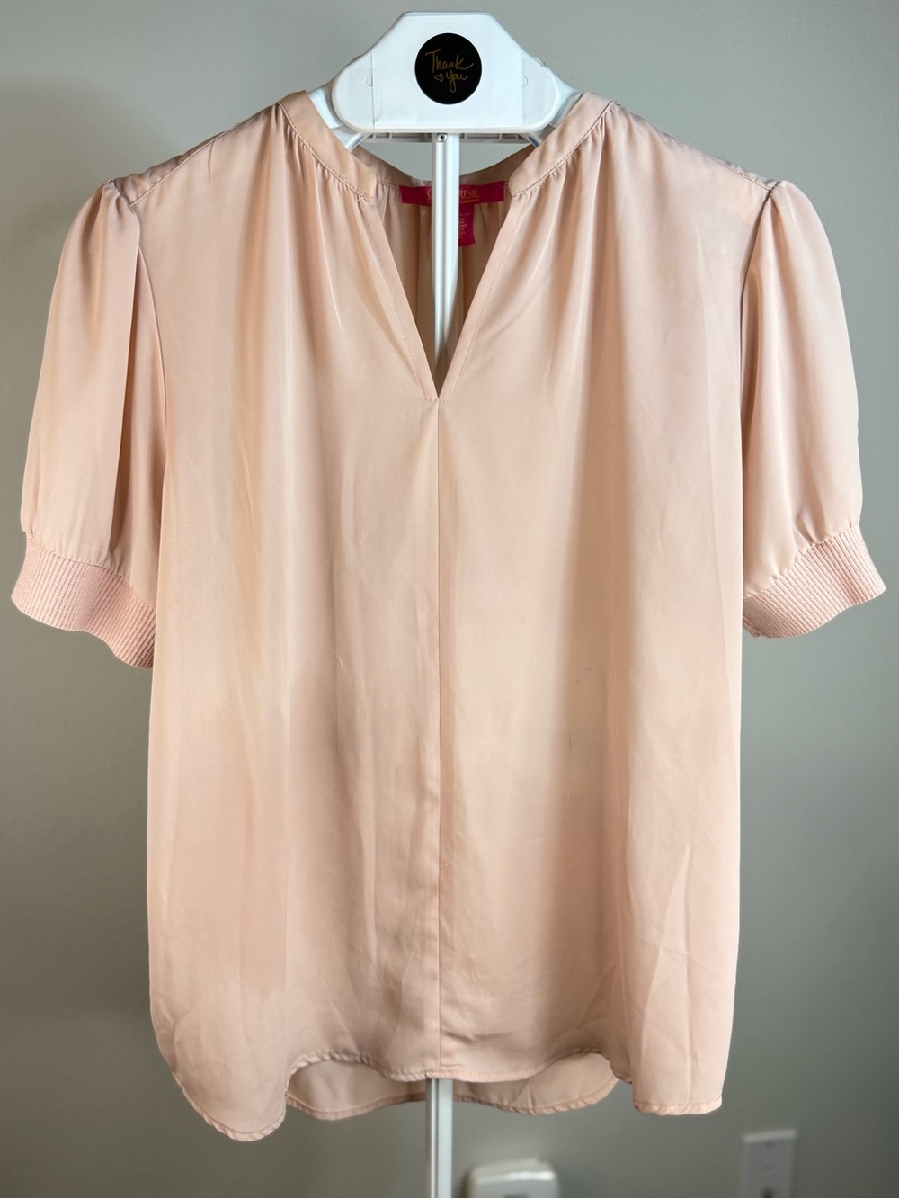 Catherine Malandrino short-sleeve split-neck blouse in a soft blush pink